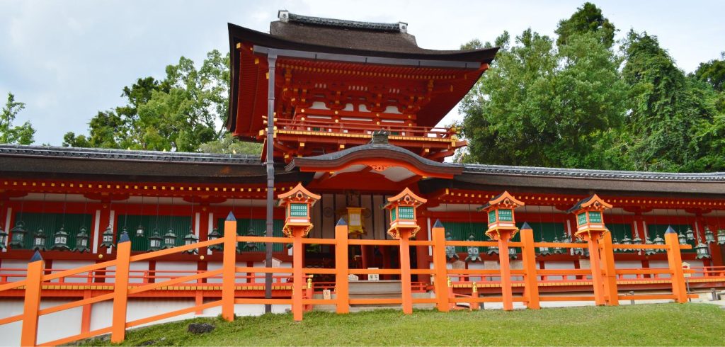 Vermilion-lacquered hall and hanging lanterns at Kasuga Taisha shrine in Nara